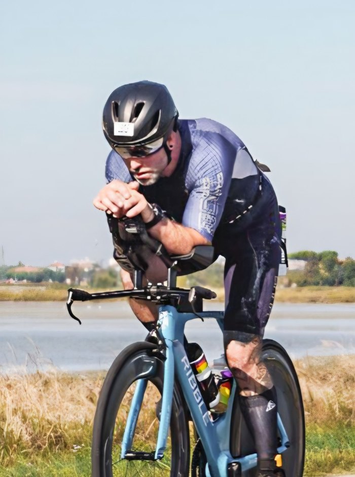 Dan riding his time-trial bike in race kit